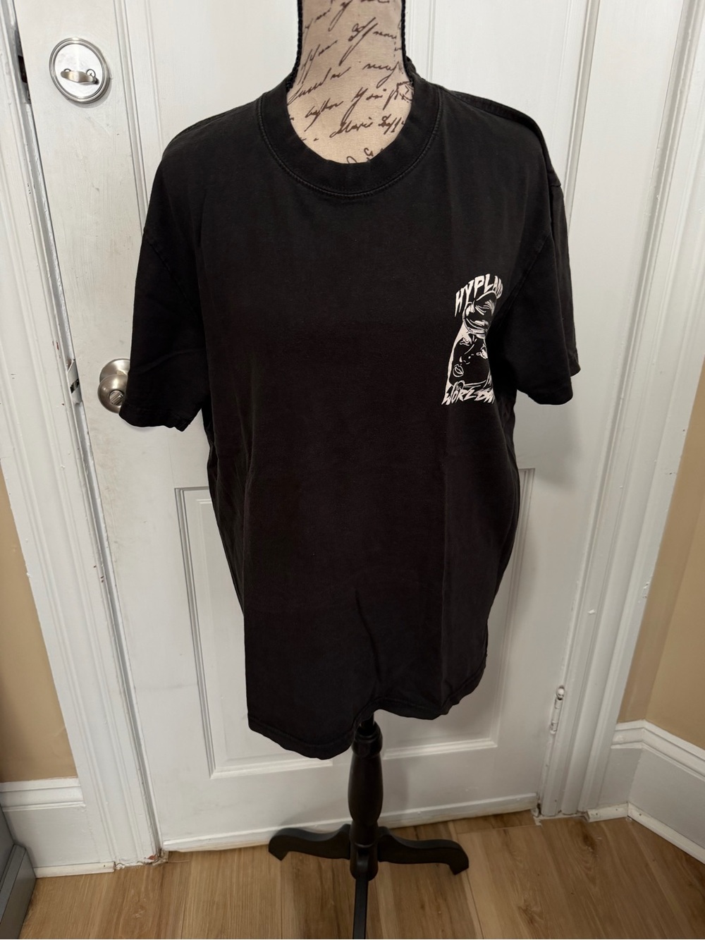 Men's Black Short-Sleeve Graphic Tee with White Chest Artwork